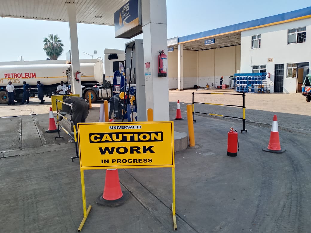 Fuel dispenser installation at a petrol station forecourt in Kenya